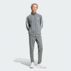 Dres męski adidas Basic 3-Stripes Tricot. Białe buty sportowe męskie Adidas, z dresówki, bez zapięcia, na fitness i siłownię. W wyprzedaży za 279.20 zł.