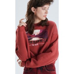 Bluza o krótkim kroju oversize - Różowy. Bluzy damskie marki Cropp. Za 69.99 zł.