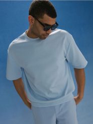 Bawełniana bluza z krótkim rękawem - błękitny. Niebieskie bluzy męskie Sinsay, l, bez wzorów, z bawełny, bez kaptura. Za 49.99 zł.