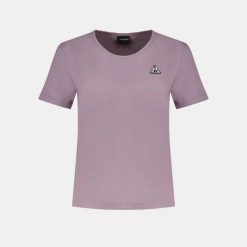 Koszulka damska Le Coq Sportif Contemporain SP N°1. Fioletowe koszulki sportowe damskie le coq sportif, s, bez wzorów, z materiału, bez kołnierzyka, bez ramiączek. Za 149.50 zł.
