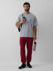 4F Spodnie dresowe joggery męskie - burgundowe 4XL. Czerwone spodnie sportowe męskie 4f, l, bez wzorów, z dresówki. Za 149.99 zł.
