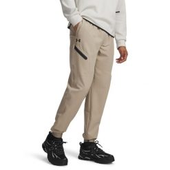 Spodnie treningowe Under Armour Unstoppable Joggers 1388823. Brązowe spodnie sportowe męskie Under Armour, l, bez wzorów, z elastanu, na fitness i siłownię. Za 294.35 zł.