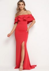 Czerwona Elegancka Sukienka Typu Hiszpanka z Rozkloszowanym Dołem i Wycięciami Tumini. Czerwone sukienki damskie Born2be, na lato, l, bez wzorów, z dzianiny, eleganckie, bez kołnierzyka, bez ramiączek, maxi, rozkloszowane. Za 189.99 zł.