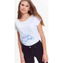 T-SHIRT DAMSKI Z NADRUKIEM. T-shirty damskie marki TROLL. W wyprzedaży za 14.99 zł.
