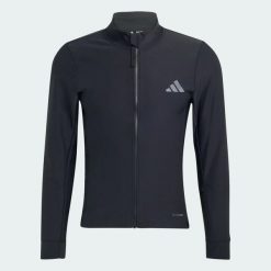 ZIMOWA KURTKA DO JAZDY NA ROWERZE CLIMAWARM. Czarne kurtki męskie Adidas, na zimę, l, bez wzorów, z dzianiny, bez kaptura. Za 799.00 zł.
