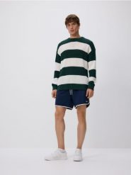 Ażurowy sweter w paski - wielobarwny. Swetry przez głowę męskie Reserved, l, w ażurowe wzory, z bawełny, bez kołnierzyka. Za 129.99 zł.