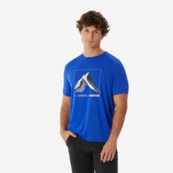 Koszulka turystyczna z krótkim rękawem męska Quechua MH500. Niebieskie koszulki sportowe męskie QUECHUA, l, bez wzorów, z materiału, bez kołnierzyka, bez ramiączek, trekkingowe. Za 69.99 zł.