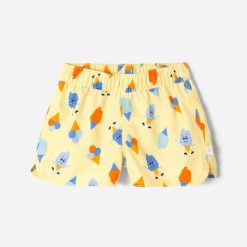 Szorty kąpielowe dla malucha Decathlon Lody. Żółte szorty dla chłopców Decathlon, bez wzorów, z materiału. Za 18.99 zł.