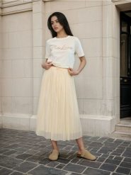 Plisowana spódnica midi z wiązaniem w pasie - żółty. Żółte spódnice damskie Sinsay, l, bez wzorów, midi. Za 49.99 zł.