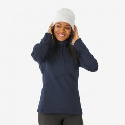 Koszulka termoaktywna narciarska damska Quechua BL 500 1/2 Zip. Niebieskie koszulki sportowe damskie WED'ZE, l, bez wzorów, z elastanu, bez kołnierzyka, bez ramiączek, narciarskie. Za 89.99 zł.