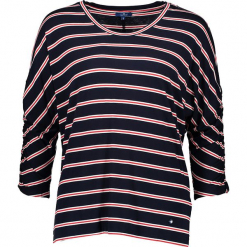Koszulka w kolorze granatowym. Niebieskie t-shirty damskie Tom Tailor Adults, w paski, z okrągłym kołnierzem. W wyprzedaży za 65.95 zł.