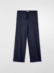 Spodnie dresowe wide leg - granatowy. Niebieskie spodnie dresowe damskie Sinsay, l, bez wzorów, z dresówki, na fitness i siłownię. Za 39.99 zł.
