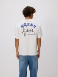 Bawełniany t-shirt Snoopy - złamana biel. T-shirty męskie Reserved, l, bez wzorów, z bawełny, bez kołnierzyka. Za 79.99 zł.