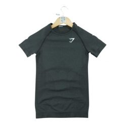 Second life - T-shirt męski do treningu Gymshark - Jak nowy. Czarne t-shirty męskie GYMSHARK, l, bez wzorów, z tkaniny, sportowe, bez kołnierzyka. Za 85.16 zł.