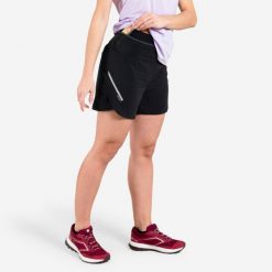Spodenki do biegania w terenie damskie Kiprun. Czarne szorty sportowe damskie KIPRUN, m, bez wzorów, ze skóry, sportowe, do biegania. Za 99.99 zł.