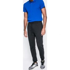 Under Armour - Spodnie. Spodnie sportowe męskie marki bonprix. W wyprzedaży za 219.90 zł.