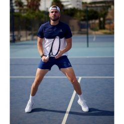 Koszulka sportowa męska Performance. Białe koszulki sportowe męskie NORDICDOTS, l, bez wzorów, z elastanu, bez kołnierzyka, bez ramiączek. Za 230.00 zł.