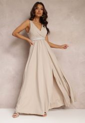 Jasnobeżowa Rozkloszowana Sukienka z Wycięciem i Paskiem w Cyrkonie Elineta. Brązowe sukienki damskie Renee, l, bez wzorów, z materiału, eleganckie, bez kołnierzyka, bez ramiączek, maxi, rozkloszowane. Za 89.99 zł.