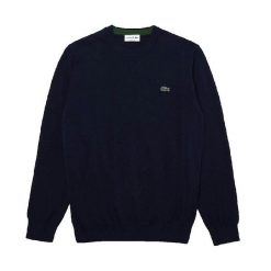 Klasyczny sweter Lacoste granatowy z okrągłym dekoltem. Niebieskie swetry przez głowę męskie Lacoste, l, bez wzorów, z bawełny, bez kołnierzyka. Za 634.45 zł.