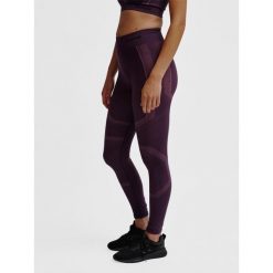 Legginsy damskie Hummel hmlMT. Czerwone legginsy damskie Hummel, bez wzorów, na fitness i siłownię. Za 177.00 zł.