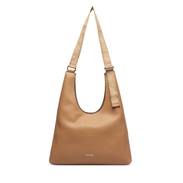 Torebka Calvin Klein. Brązowe torebki do ręki damskie Calvin Klein, bez wzorów, klasyczne, bez dodatków. Za 569.99 zł.