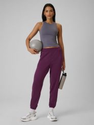 4F Spodnie dresowe joggery z modalem damskie - fioletowe L. Fioletowe spodnie dresowe damskie 4f, l, bez wzorów, z dresówki. Za 159.99 zł.