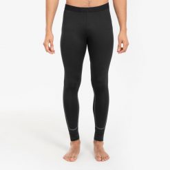 Legginsy termiczne do piłki nożnej Kipsta Keepcomfort 100. Czarne legginsy sportowe męskie KIPSTA, xl, bez wzorów, z elastanu, do koszykówki. Za 69.99 zł.