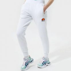 SPODNIE DAMSKIE DRESOWE ELLESSE SPORTOWE XS. Białe spodnie dresowe damskie Ellesse, uniwersalny, bez wzorów, z bawełny. Za 148.09 zł.