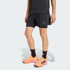 Szorty TECH ESSENTIALS WORKOUT 2 w 1. Czarne buty sportowe męskie Adidas, bez zapięcia, na fitness i siłownię, climacool (adidas). Za 239.00 zł.