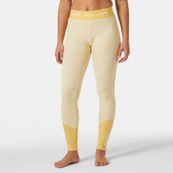 Damskie legginsy z merynosów Helly Hansen Lifa. Żółte legginsy damskie Helly Hansen, bez wzorów, z wełny, trekkingowe. Za 369.50 zł.