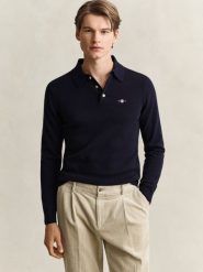 Gant dzianinowa koszulka polo z wełny jagnięcej Mężczyźni Wełna niebieski, L. Niebieskie koszulki polo męskie GANT, l, bez wzorów, z dzianiny, eleganckie, bez ramiączek. Za 749.95 zł.