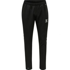 Spodnie treningowe Hummel Core XK Poly. Czarne krótkie spodenki sportowe męskie Hummel, na jesień, m, bez wzorów, z materiału, na fitness i siłownię. Za 163.95 zł.