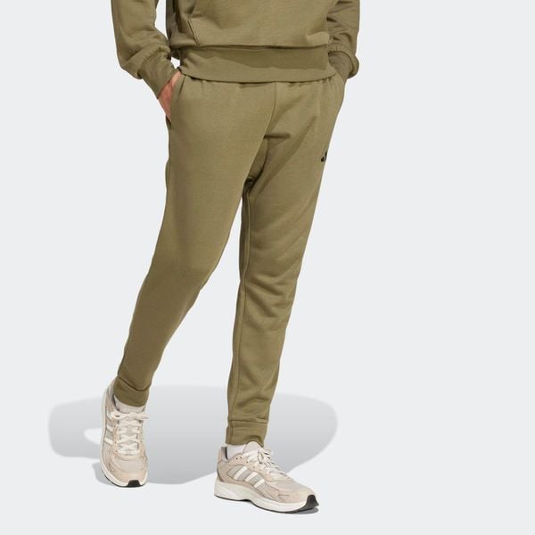 Spodnie dresowe męskie ADIDAS Essentials Feelcozy. Zielone buty sportowe męskie Adidas, z dresówki, bez zapięcia, na fitness i siłownię. Za 219.99 zł.