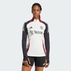 Bluza Manchester United Tiro 24 Training. Białe bluzy sportowe damskie Adidas, s, bez wzorów, z materiału, bez kaptura, do piłki nożnej. Za 349.00 zł.