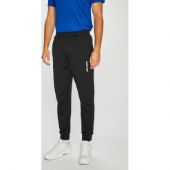 Calvin Klein Performance - Spodnie. Szare spodnie sportowe męskie Calvin Klein Performance, z bawełny. Za 399.90 zł.