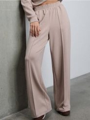 Spodnie wide leg z domieszką wiskozy - beżowy. Brązowe spodnie materiałowe damskie Sinsay, l, bez wzorów, z wiskozy. Za 49.99 zł.