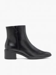 Czarne skórzane botki. Czarne botki damskie Ryłko, ze skóry, eleganckie, bez obcasa, na obcasie, bez zapięcia. Za 449.99 zł.