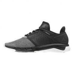 Buty do chodzenia damskie Reebok Fast Flexweave. Czarne obuwie sportowe damskie Reebok, bez wzorów, z gumy, trekkingowe. Za 398.00 zł.