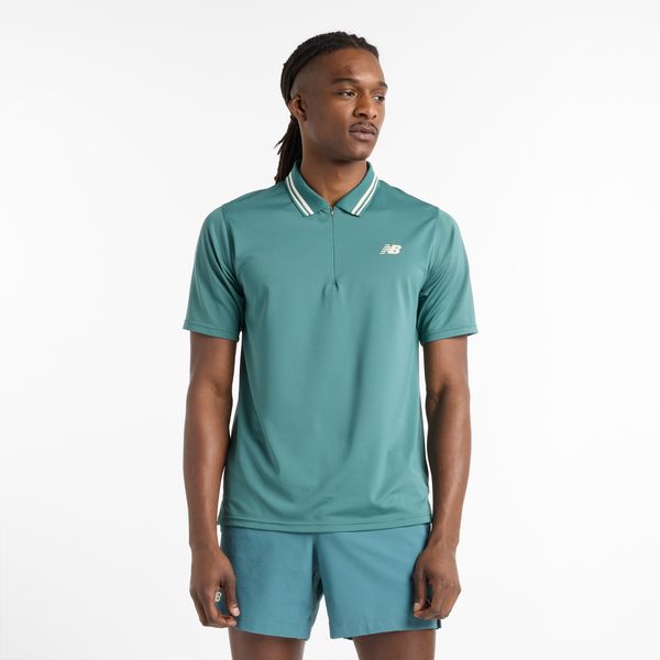 Koszulka męska New Balance MT41402NUS – zielona. Zielone koszulki polo męskie New Balance, m, bez wzorów, z materiału, bez kołnierzyka, bez ramiączek, tenisowe. Za 249.99 zł.