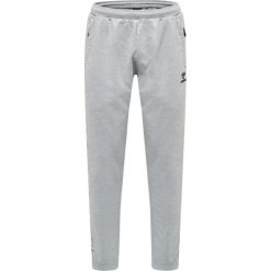 Spodnie sportowe do joggingu Hummel Move Grid. Szare krótkie spodenki sportowe męskie Hummel, m, bez wzorów, z dresówki, do biegania. Za 233.50 zł.