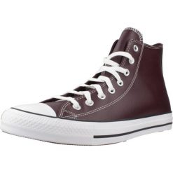 Buty CONVERSE CHUCK TAYLOR ALL STAR FAUX LEATHER Bordeaux. Czerwone trampki męskie Converse, bez wzorów, z syntetyku, retro, bez zapięcia. Za 261.99 zł.