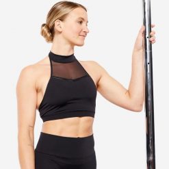 Stanik do pole dance Starever. Czarne biustonosze DOMYOS, l, bez wzorów, z materiału, sportowe, bez kołnierzyka. Za 119.99 zł.