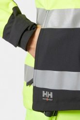 Moteriska striuke HELLY HANSEN W Luna Hi Vis Winter, geltona L. Kurtki sportowe damskie Helly Hansen, l, bez wzorów, bez kaptura. Za 1,023.37 zł.