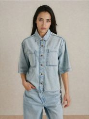 Jeansowa koszula z krótkim rękawem - niebieski. Niebieskie koszule damskie Sinsay, l, bez wzorów, z jeansu, bez kołnierzyka, bez ramiączek. Za 59.99 zł.