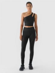 4F Legginsy treningowe szybkoschnące 4F x Anna Lewandowska - czarne M. Czarne legginsy damskie 4f, m, bez wzorów, z dzianiny. W wyprzedaży za 89.99 zł.