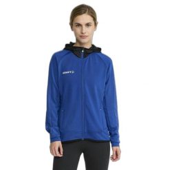 Damska kurtka dresowa z pełnym zamkiem błyskawicznym Craft Extend. Niebieskie kurtki damskie Craft, m, bez wzorów, z dresówki, bez kaptura. Za 341.00 zł.