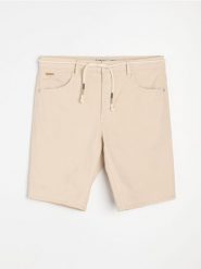 Bawełniane szorty jeansowe - zielony. Zielone szorty męskie Sinsay, m, bez wzorów, z bawełny. Za 49.99 zł.