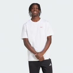 Koszulka z grafiką Pennant Trim. Niebieskie buty sportowe męskie Adidas, z bawełny, bez zapięcia, na fitness i siłownię. Za 109.00 zł.