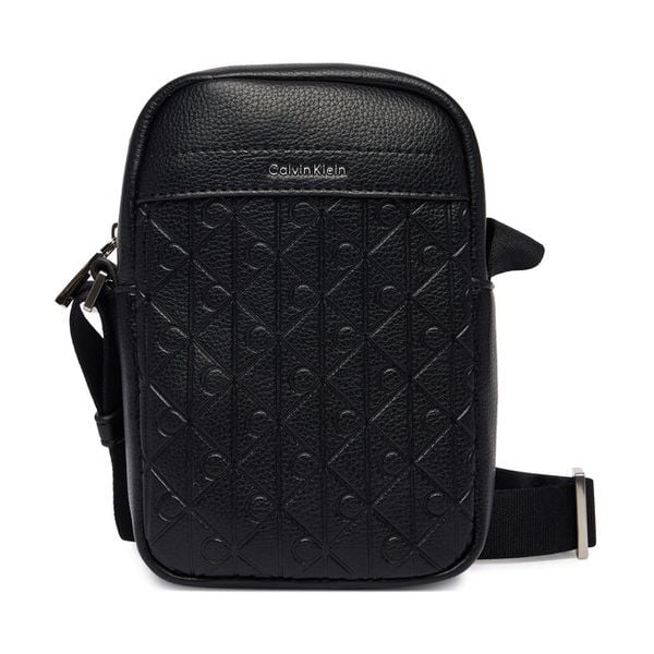 Saszetka Calvin Klein. Czarne saszetki męskie Calvin Klein, młodzieżowe, małe. Za 199.99 zł.