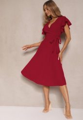 Bordowa Kopertowa Sukienka z Rozkloszowanym Dołem i Ozdobnym Wiązaniem Dannola. Czerwone sukienki damskie Renee, na co dzień, m, bez wzorów, eleganckie, bez kołnierzyka, bez ramiączek, midi, kopertowe. Za 89.99 zł.